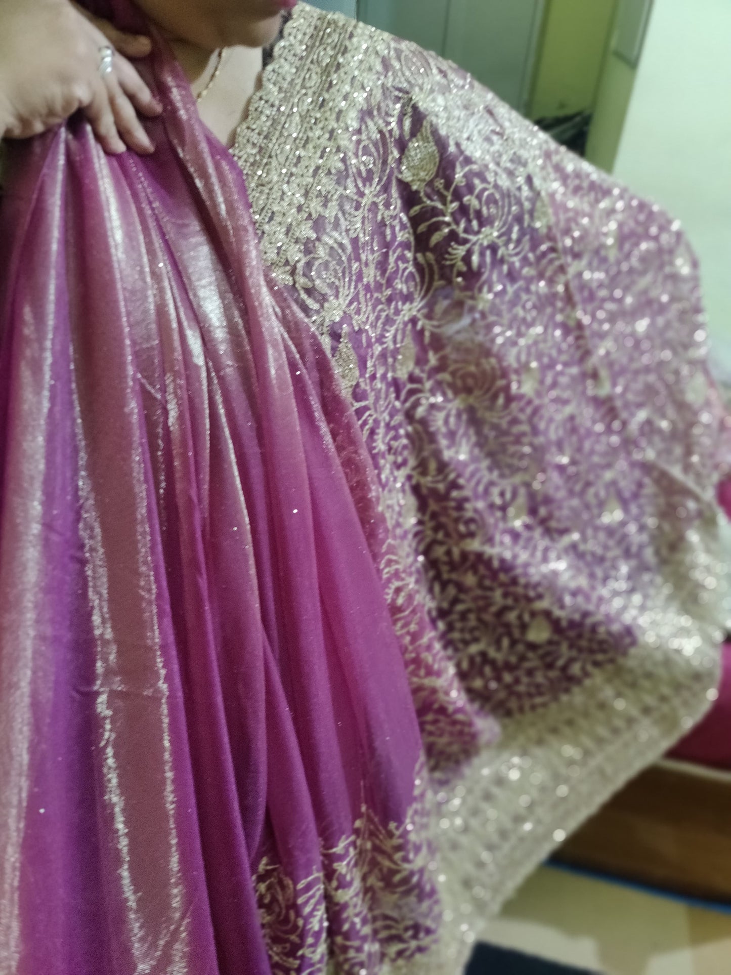 Zari embroidered soft tissue net saree